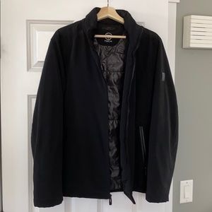 Tumi Tech men’s black jacket.